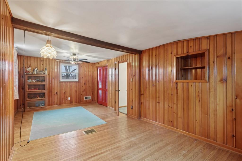 631 George Street Turtle Creek, PA 15145 - Photo 9 of 44 a view of an empty room with wooden floor and closet