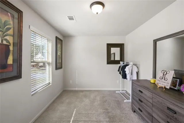 a view of room with window and workspace