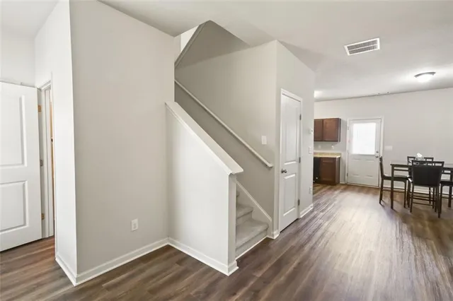 a view of livingroom with furniture and wooden floor