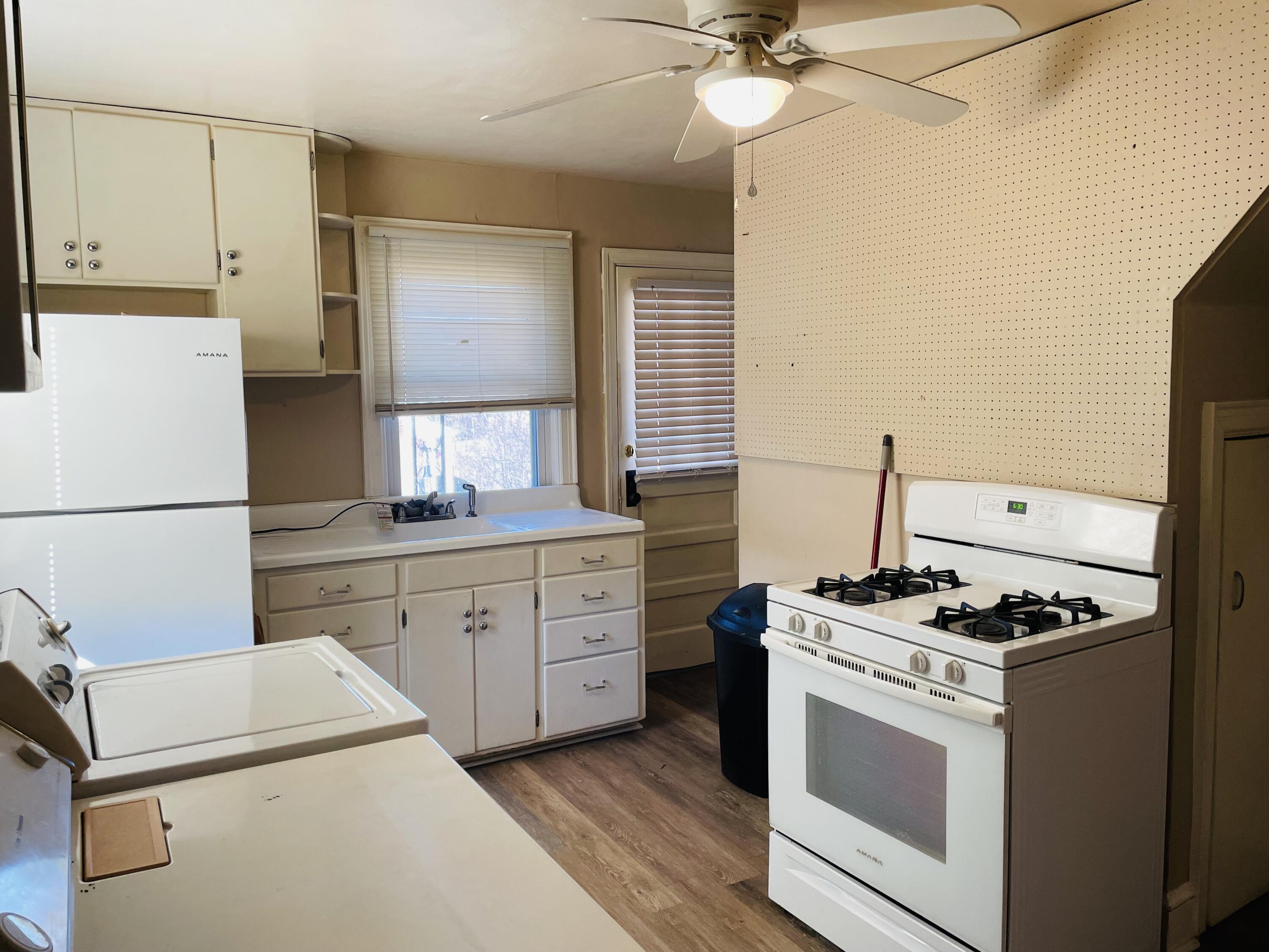 1152 Hamilton Avenue Southwest Roanoke, VA 24015 - Photo 17 of 36 kitchen area and laundry