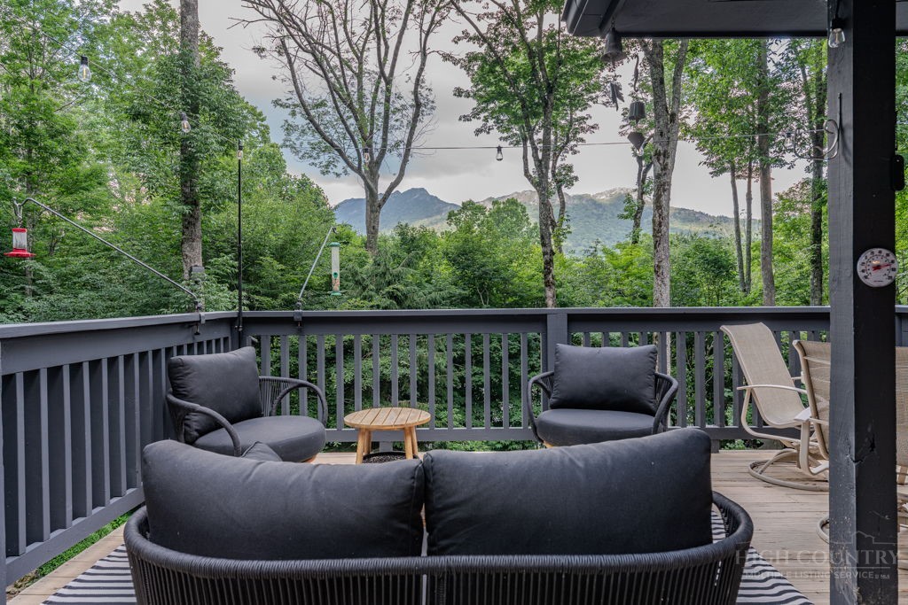 102 Ridge Drive Linville, NC 28646 - Photo 47 of 48 a balcony with couches and a potted plant
