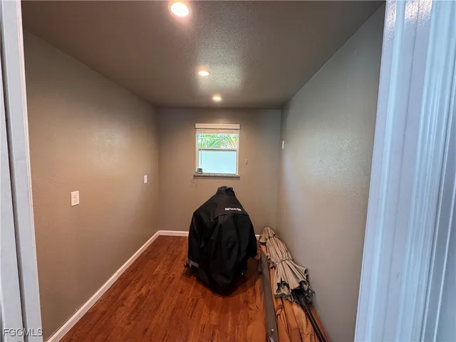 a view of a livingroom from a hallway
