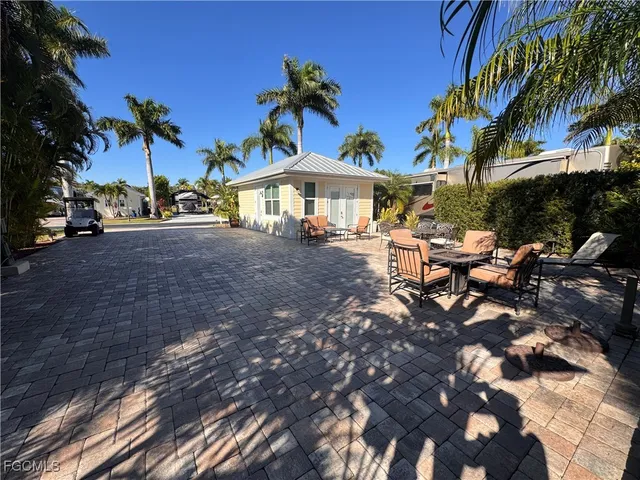a view of a road with a building in the background