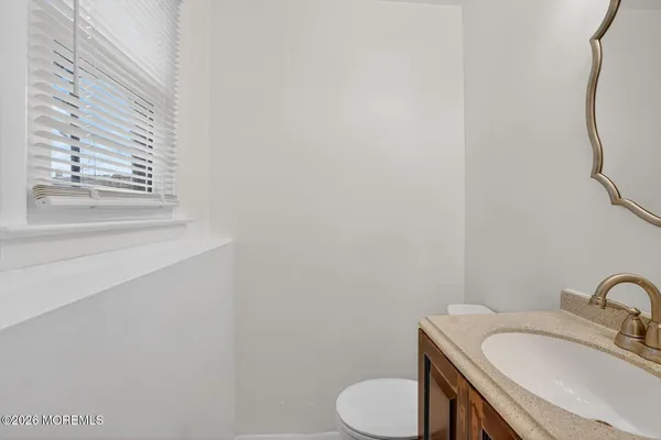 a bathroom with a sink and a toilet