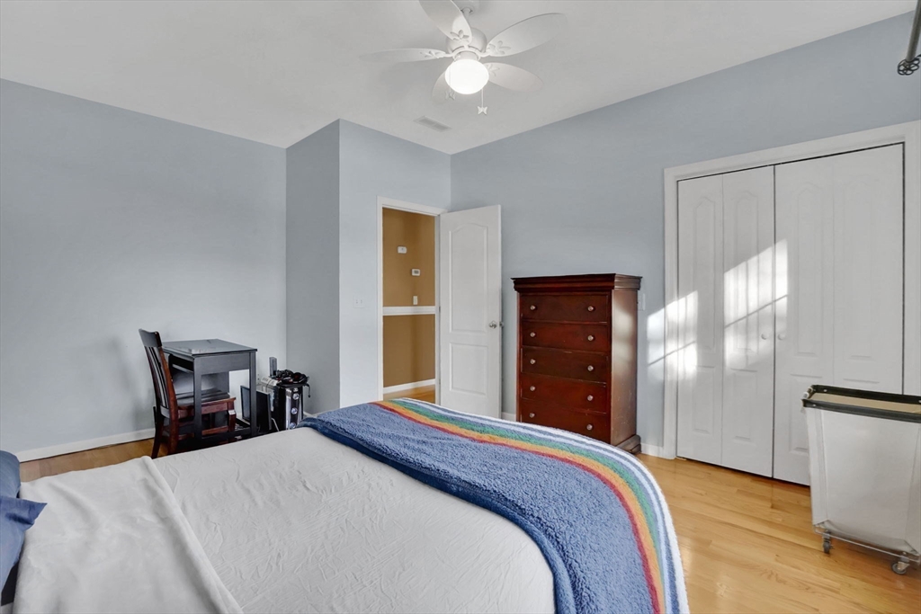 1 Pioneer Drive Palmer, MA 01069 - Photo 19 of 31 a bedroom with a bed table and a closet