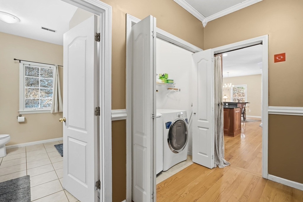 1 Pioneer Drive Palmer, MA 01069 - Photo 25 of 31 a view of a hallway with washer and dryer