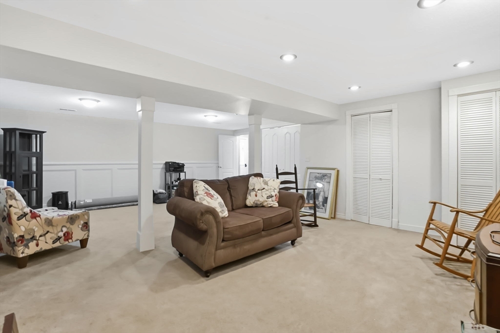 1 Pioneer Drive Palmer, MA 01069 - Photo 27 of 31 a living room with furniture and a large window