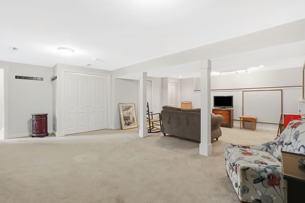 1 Pioneer Drive Palmer, MA 01069 - Photo 28 of 31 a view of a livingroom with furniture and storage