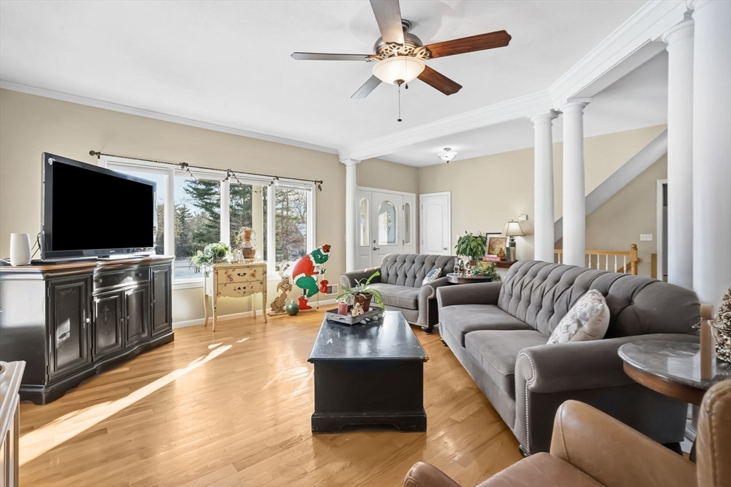 1 Pioneer Drive Palmer, MA 01069 - Photo 9 of 31 a living room with furniture and a flat screen tv
