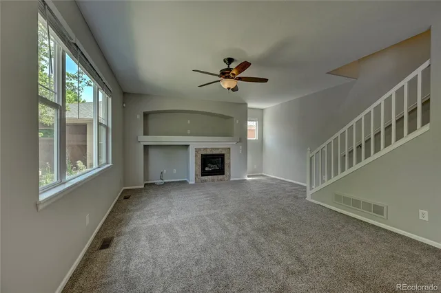 a view of a livingroom with a staircase