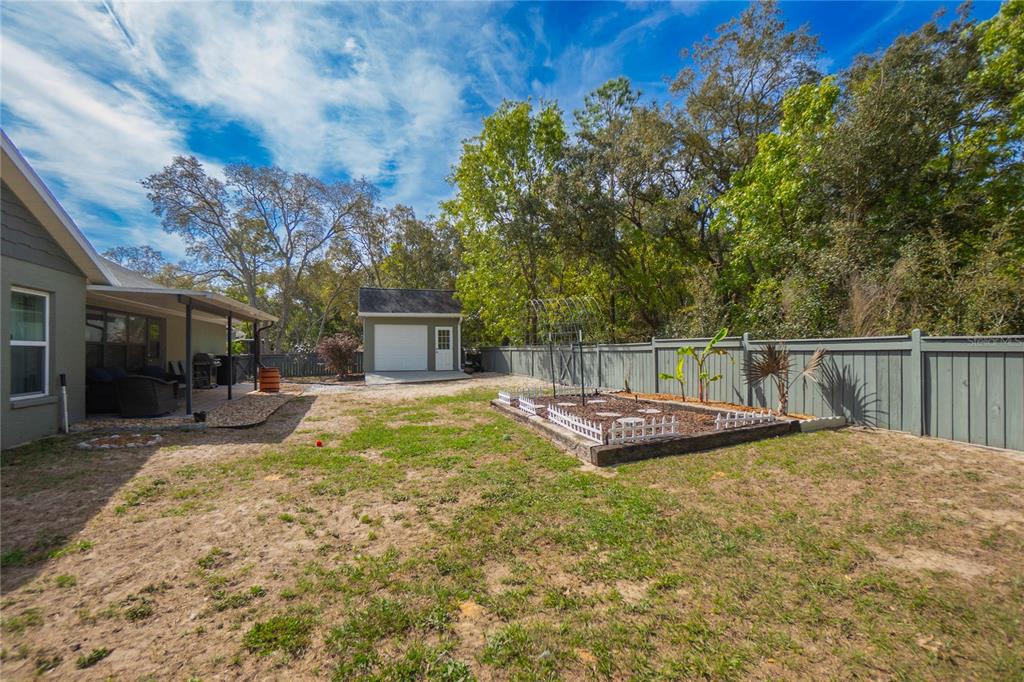 5466 West Tortuga Loop Lecanto, FL 34461 - Photo 38 of 41 a view of a backyard with swimming pool