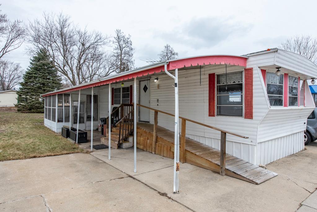 38285 North Sheridan Road, Unit 126 Beach Park, IL 60087 - Photo 1 of 17 a view of a house with a deck