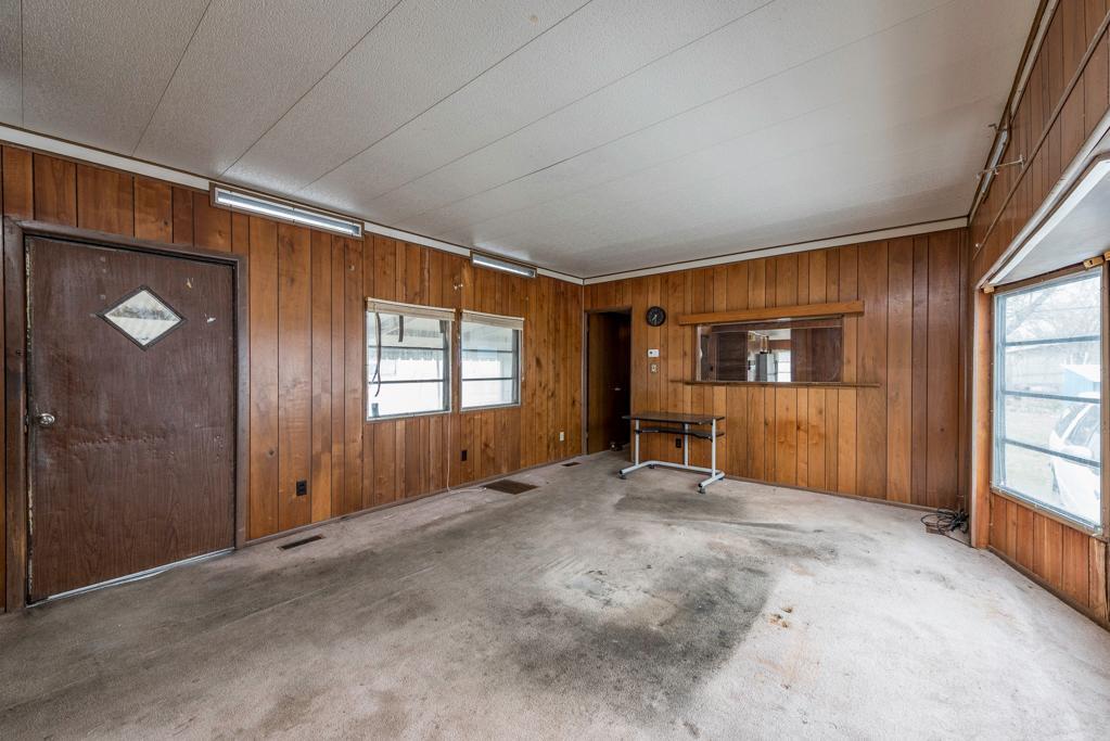 38285 North Sheridan Road, Unit 126 Beach Park, IL 60087 - Photo 3 of 17 an empty room with windows