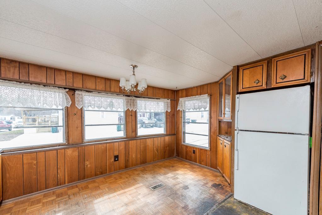 38285 North Sheridan Road, Unit 126 Beach Park, IL 60087 - Photo 8 of 17 a view of an empty room with a window