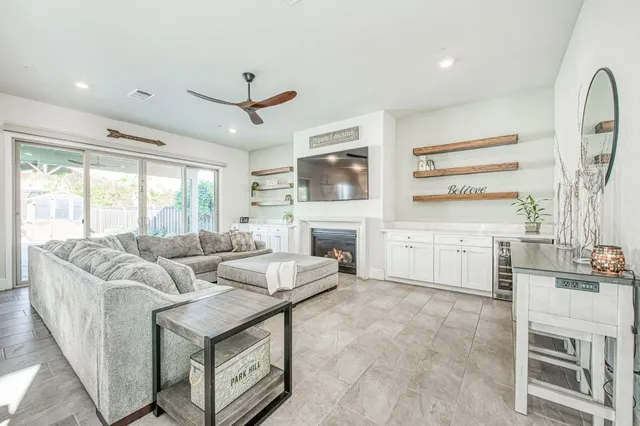 a bathroom with a sink a mirror and a window