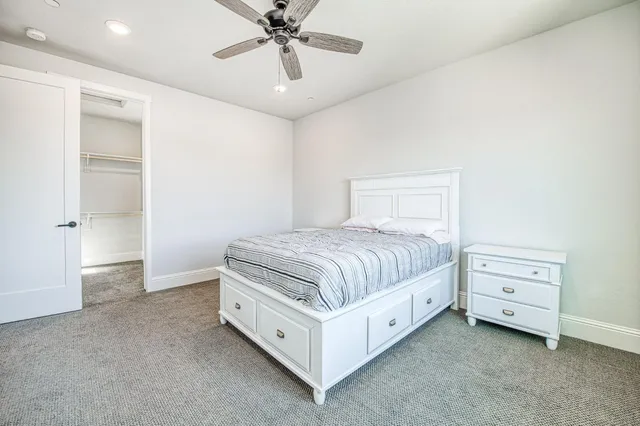 a white bath tub sitting next to a window
