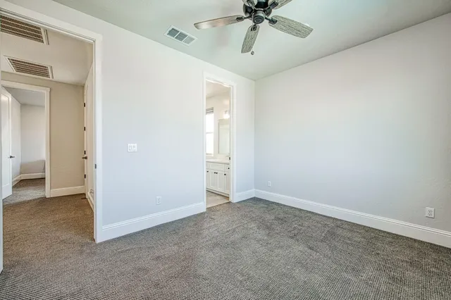 a view of a house with outdoor space and sitting area