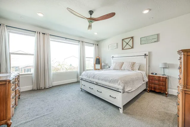 a view of a backyard with sitting area and entertaining space