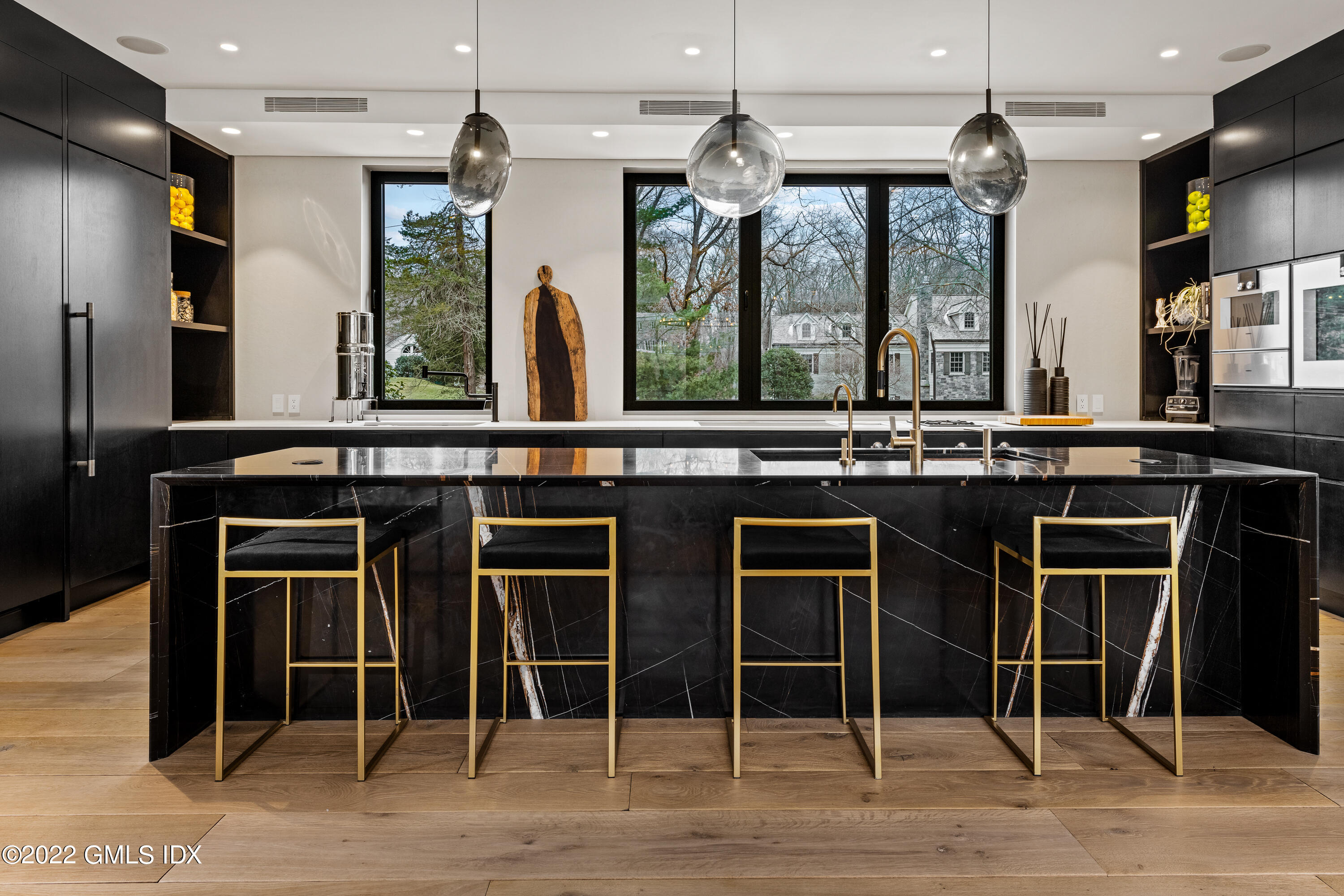 34 Beechcroft Road Greenwich, CT 06830 - Photo 12 of 25 a kitchen with a window and a table