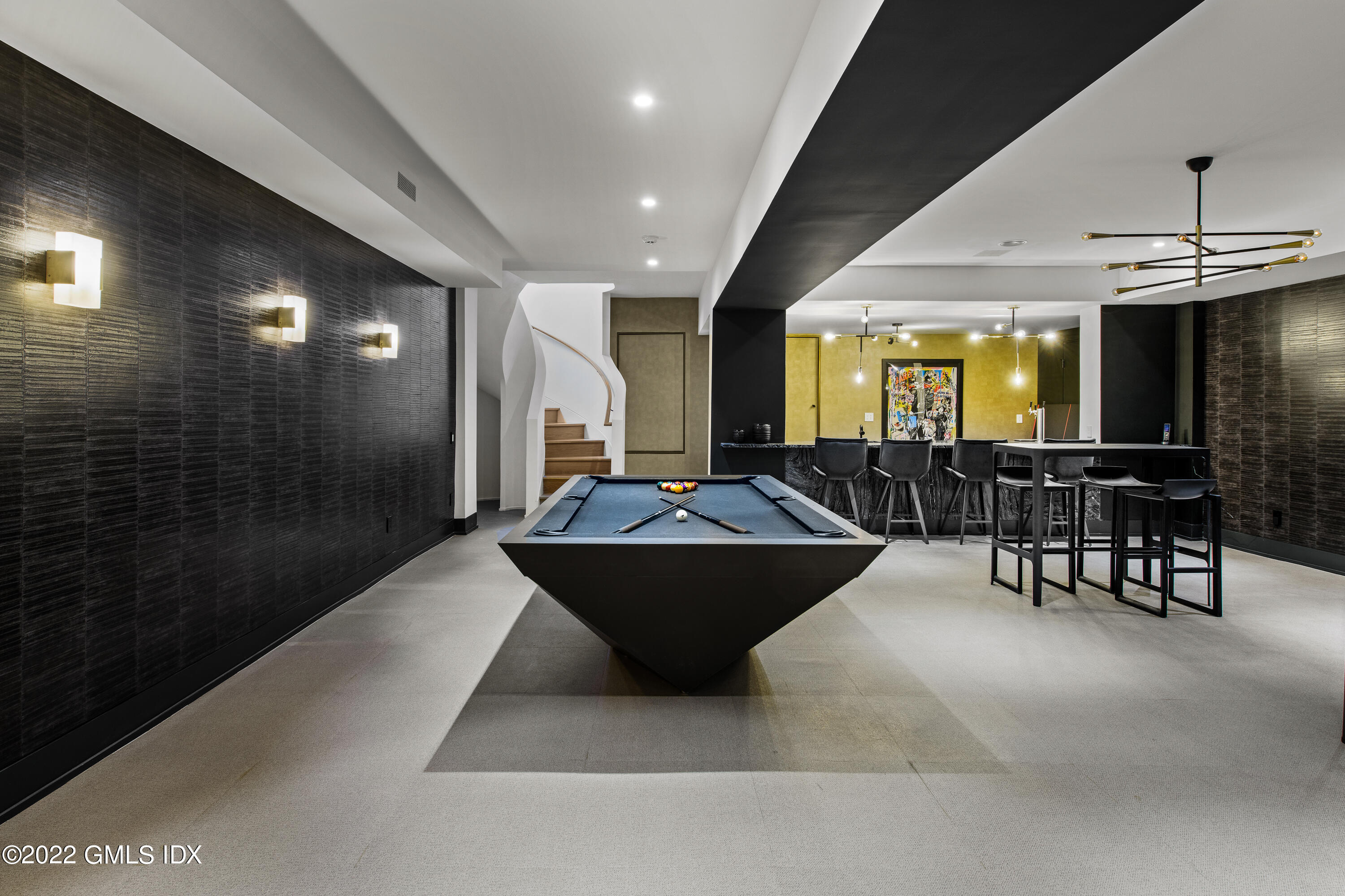 34 Beechcroft Road Greenwich, CT 06830 - Photo 15 of 25 a living room with furniture a large window and potted plant