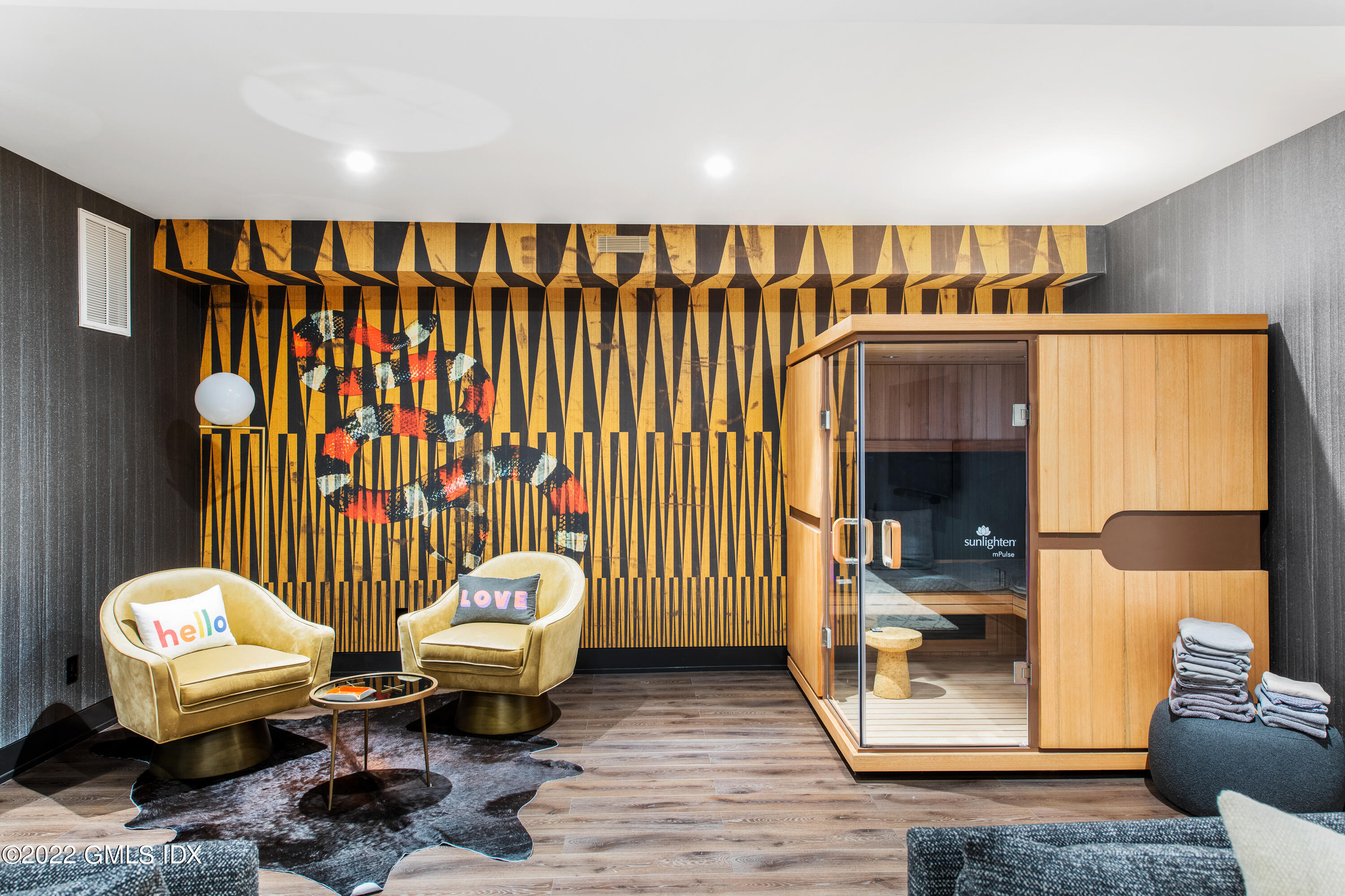 34 Beechcroft Road Greenwich, CT 06830 - Photo 16 of 25 a living room with a couch and potted plant