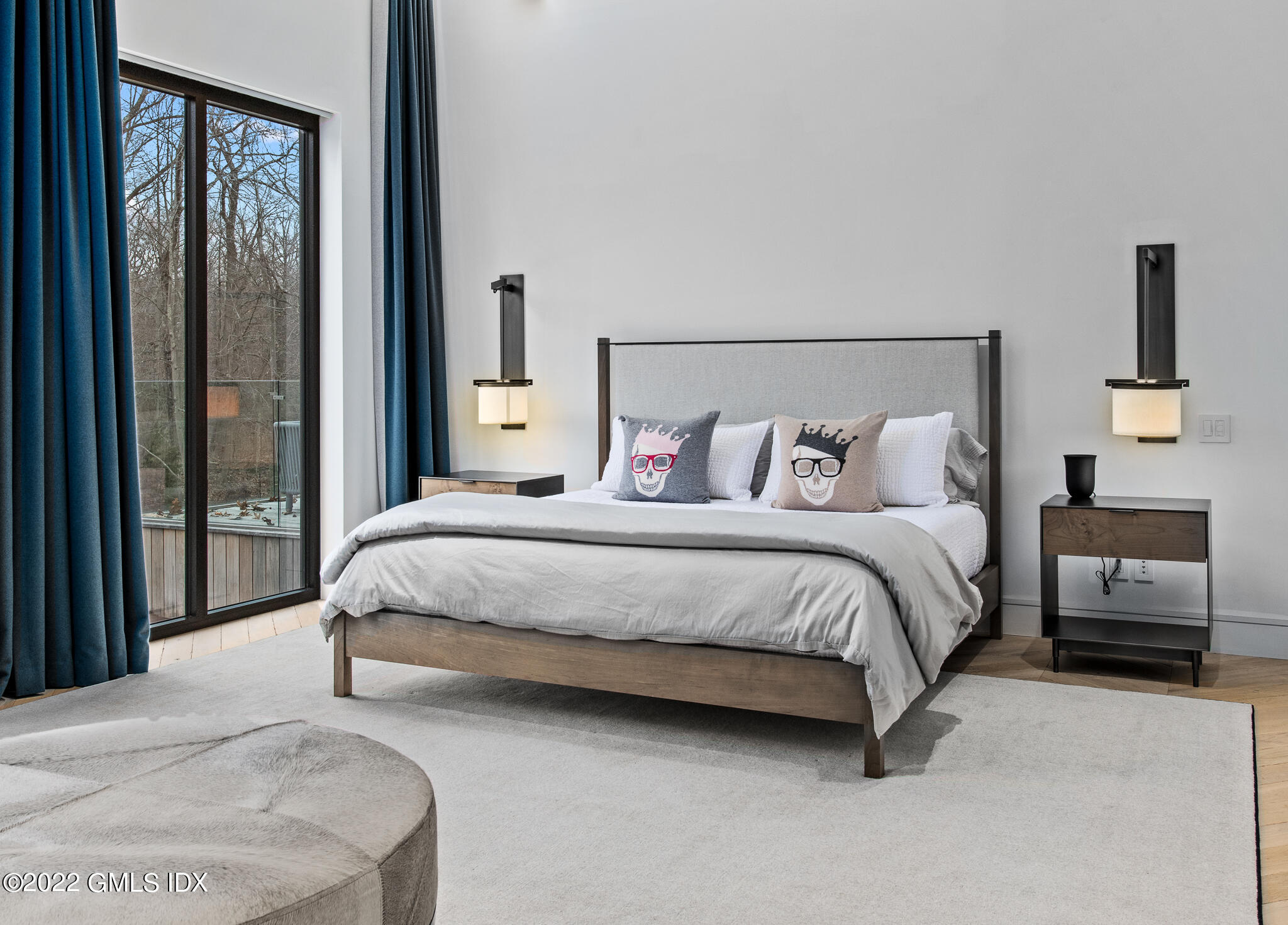 34 Beechcroft Road Greenwich, CT 06830 - Photo 18 of 25 a bedroom with a bed and a night stand