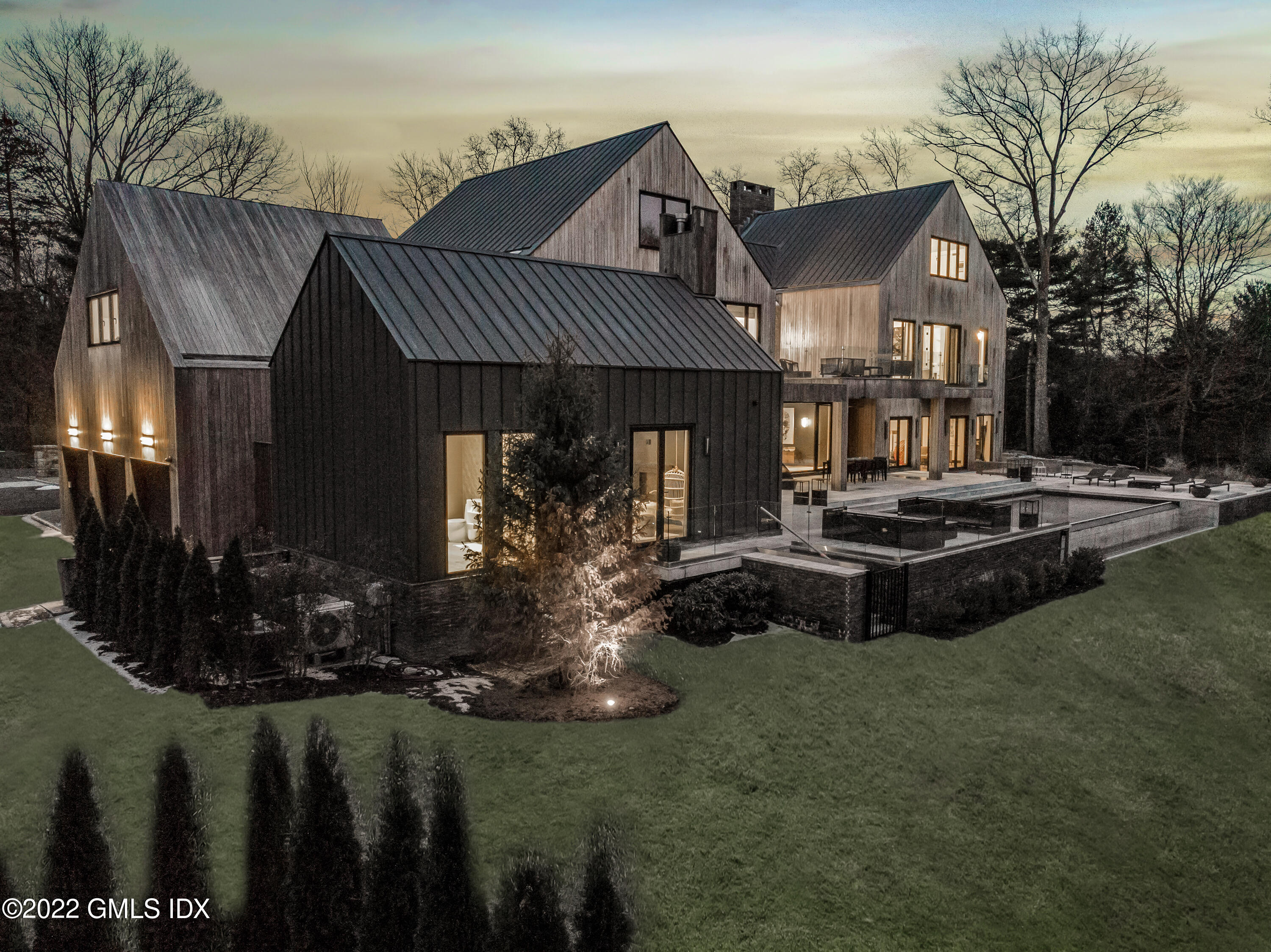 34 Beechcroft Road Greenwich, CT 06830 - Photo 25 of 25 a front view of a house with garden