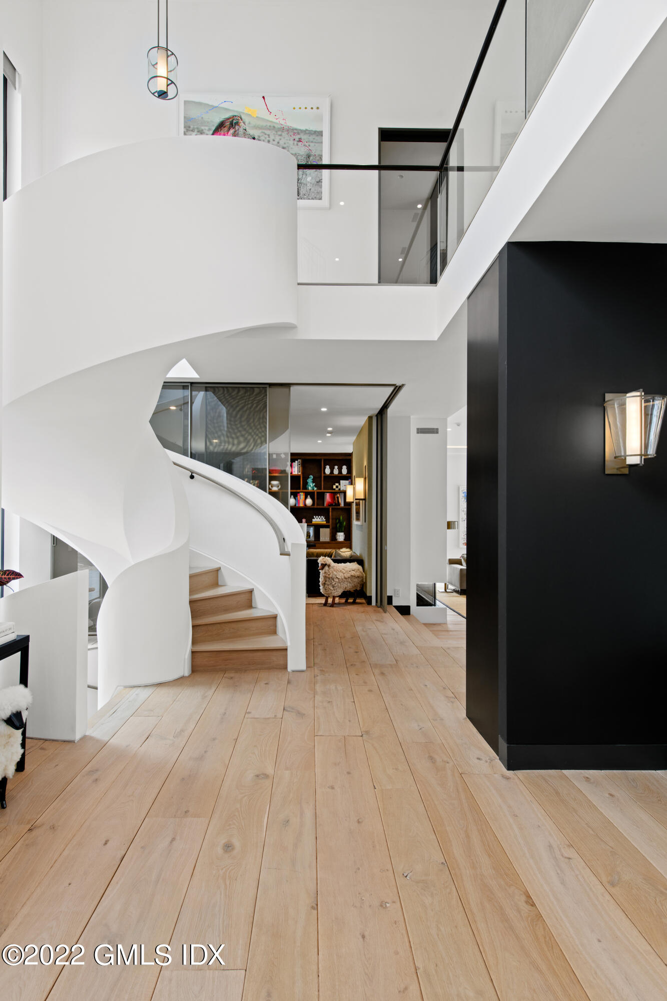 34 Beechcroft Road Greenwich, CT 06830 - Photo 4 of 25 a view of a hallway with stairs