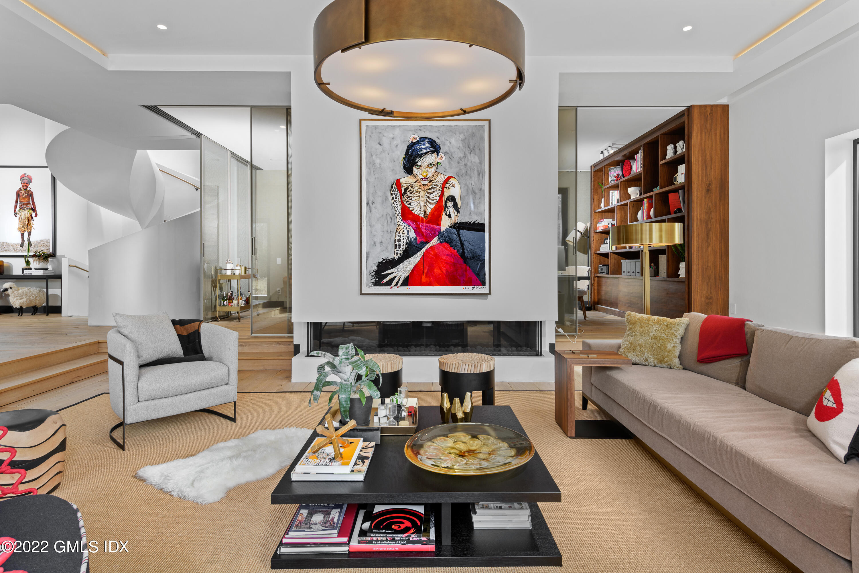 34 Beechcroft Road Greenwich, CT 06830 - Photo 5 of 25 a living room with furniture and painting on the wall