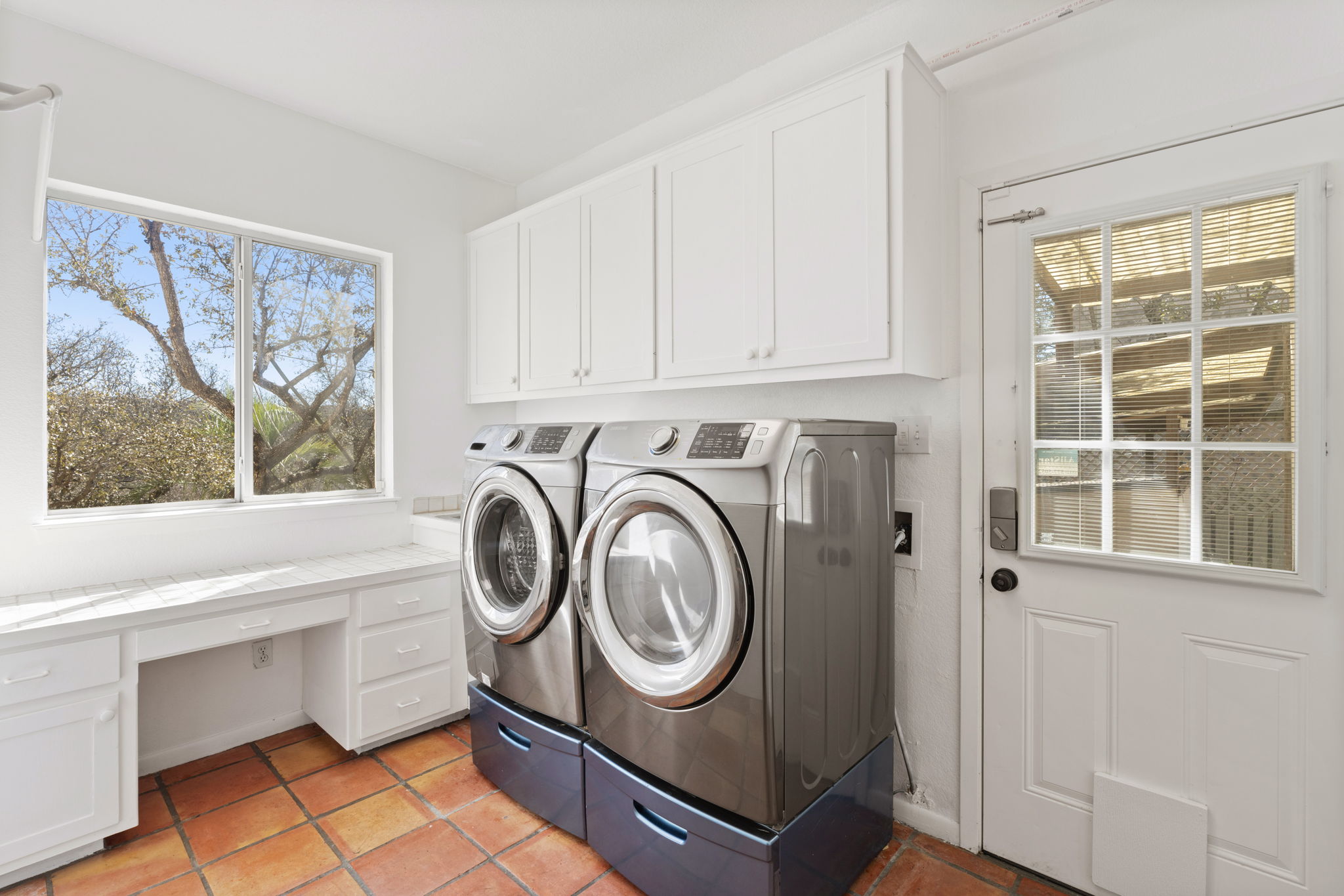 3405 Bee Creek Road Spicewood, TX 78669 - Photo 12 of 40 a utility room with dryer and washer