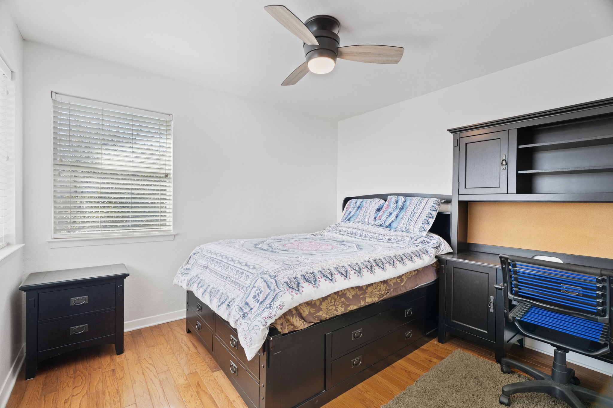 3405 Bee Creek Road Spicewood, TX 78669 - Photo 24 of 40 a bedroom with a bed and a dresser