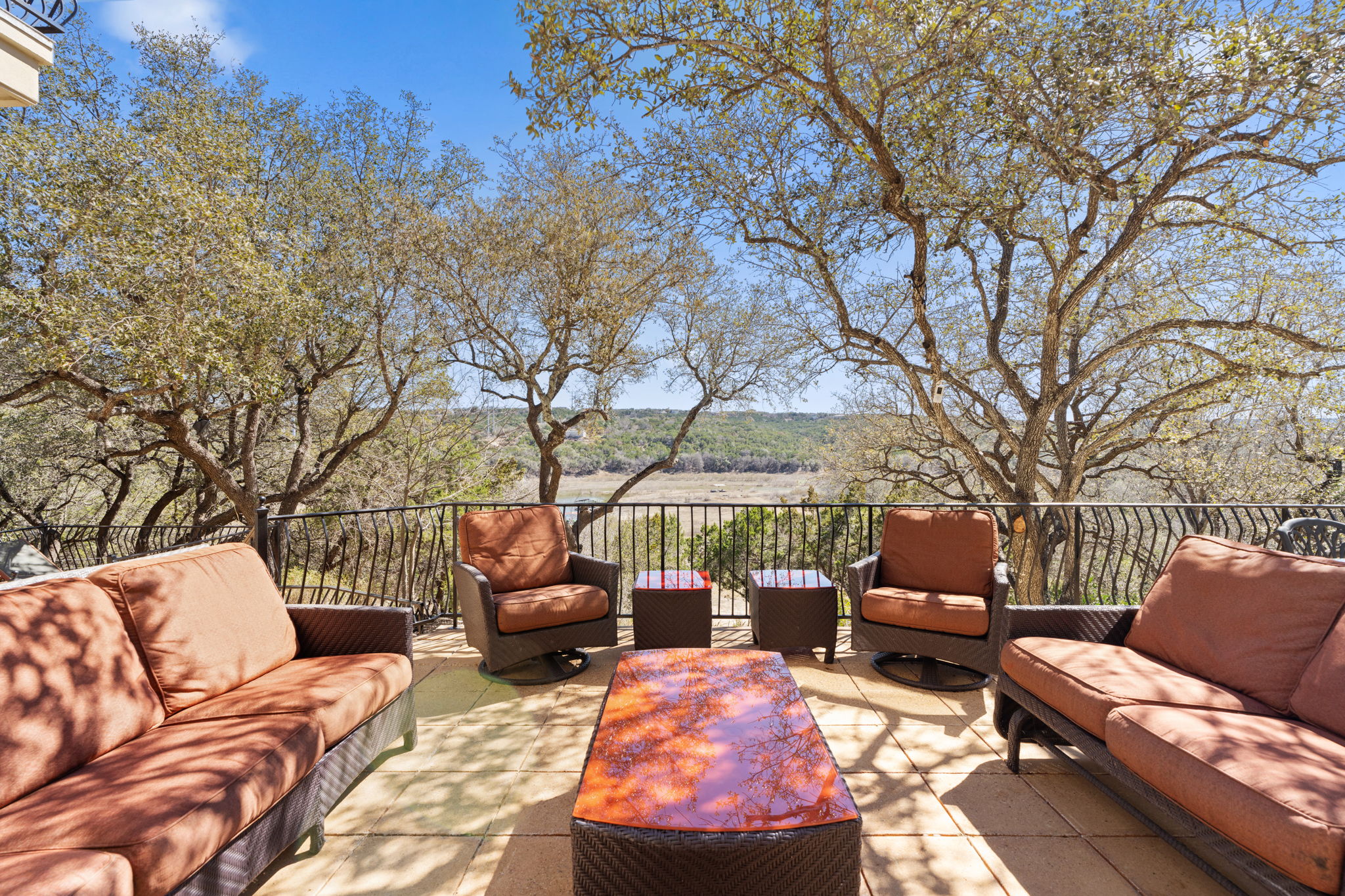 3405 Bee Creek Road Spicewood, TX 78669 - Photo 32 of 40 a outdoor living space with furniture and a fireplace
