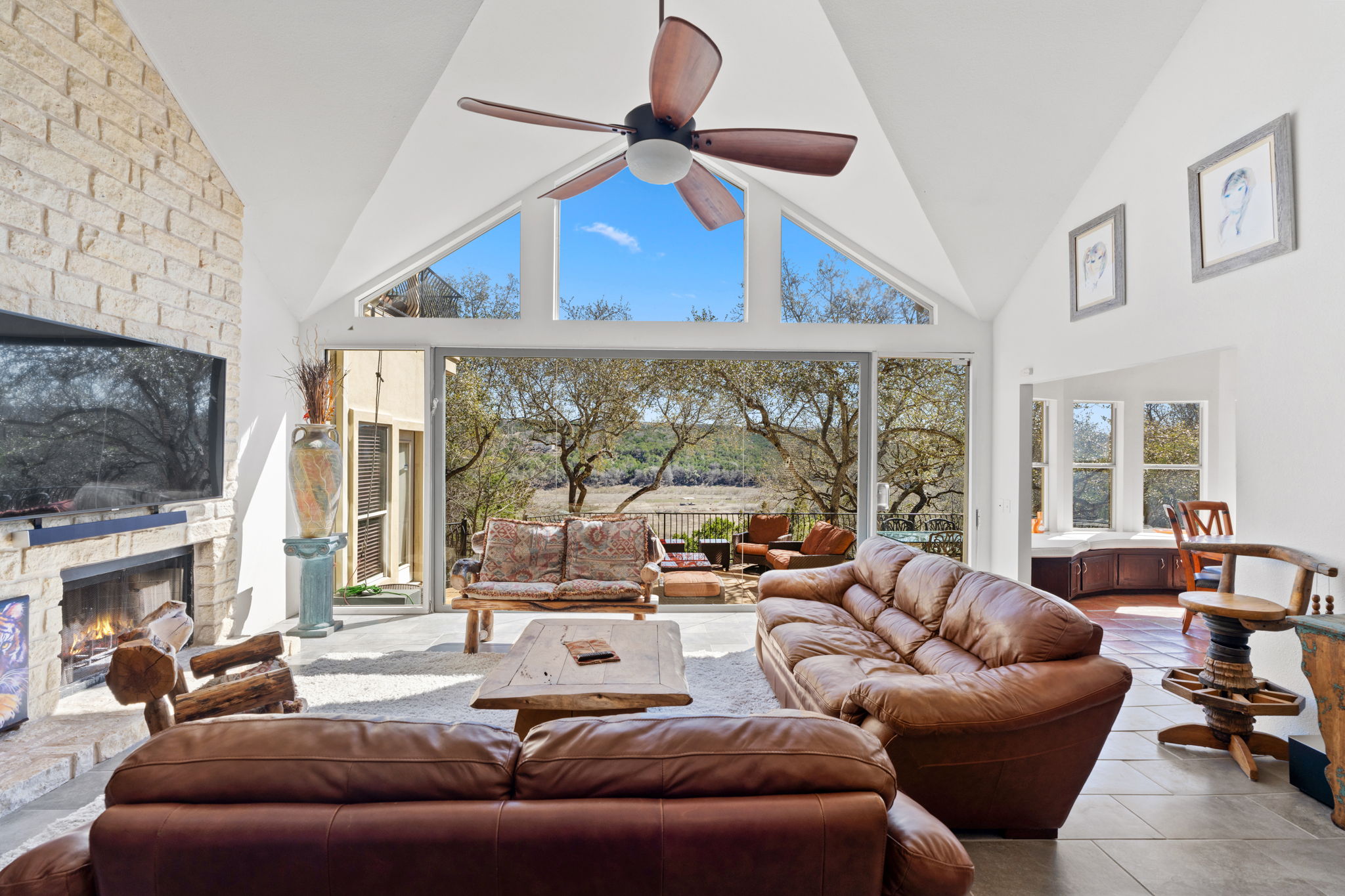 3405 Bee Creek Road Spicewood, TX 78669 - Photo 6 of 40 a living room with furniture and a large window
