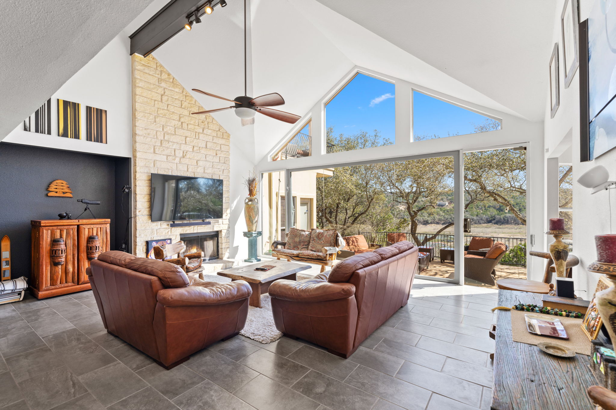 3405 Bee Creek Road Spicewood, TX 78669 - Photo 7 of 40 a living room with furniture and a large window