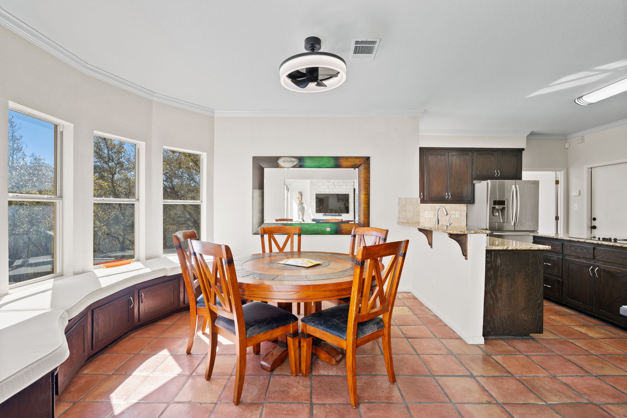 3405 Bee Creek Road Spicewood, TX 78669 - Photo 10 of 40 a dining room with furniture and window