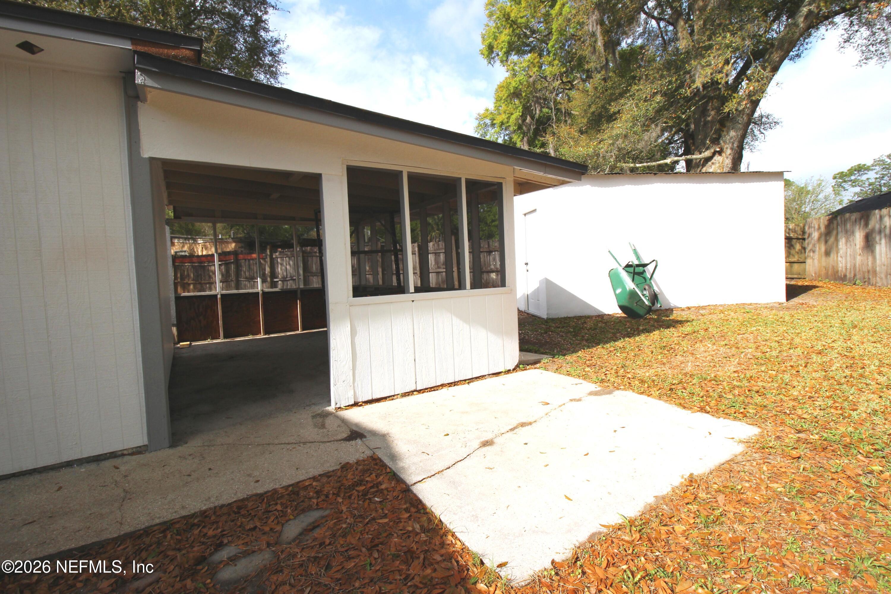 1304 King Arthur Road Jacksonville, FL 32211 - Photo 5 of 25 a view of backyard of the house