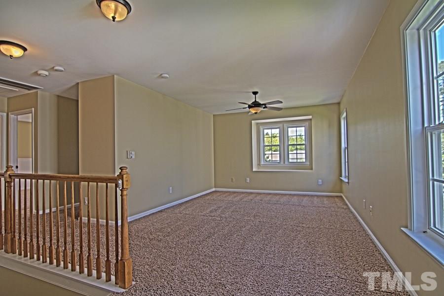 7120 Lowell Ridge Road Raleigh, NC 27616 - Photo 11 of 19 an empty room with windows