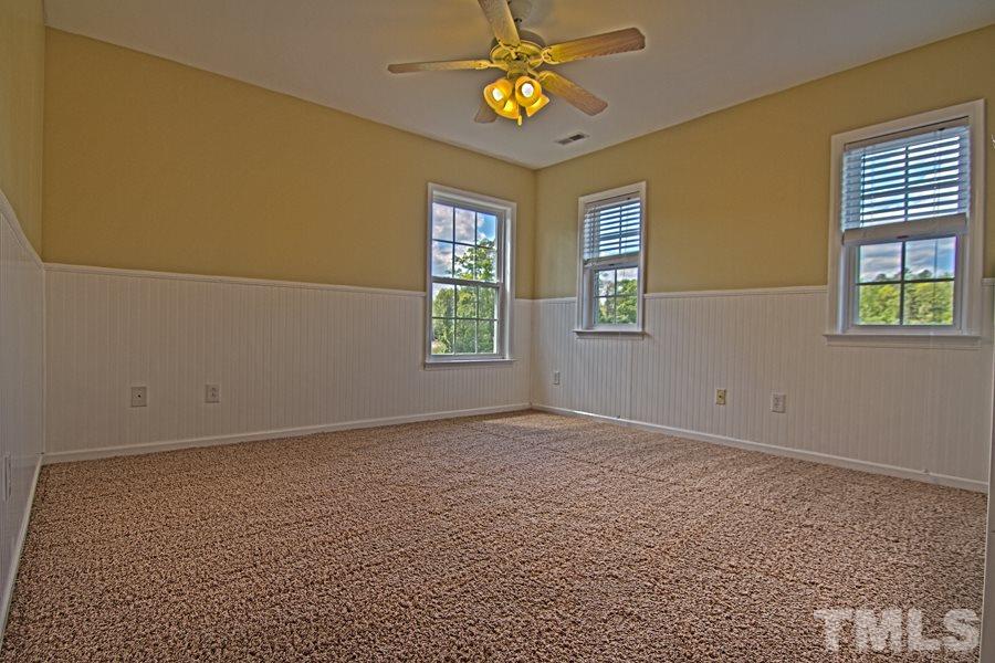 7120 Lowell Ridge Road Raleigh, NC 27616 - Photo 15 of 19 a view of an empty room with a window