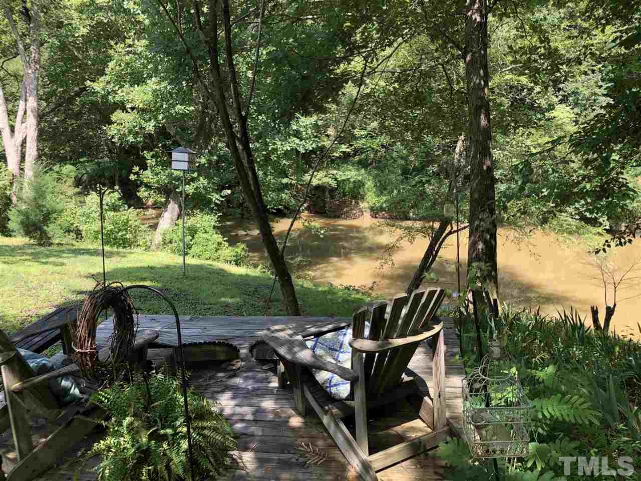 1125 Harris Mill Road Rougemont, NC 27572 - Photo 3 of 4 a view of a park with large trees