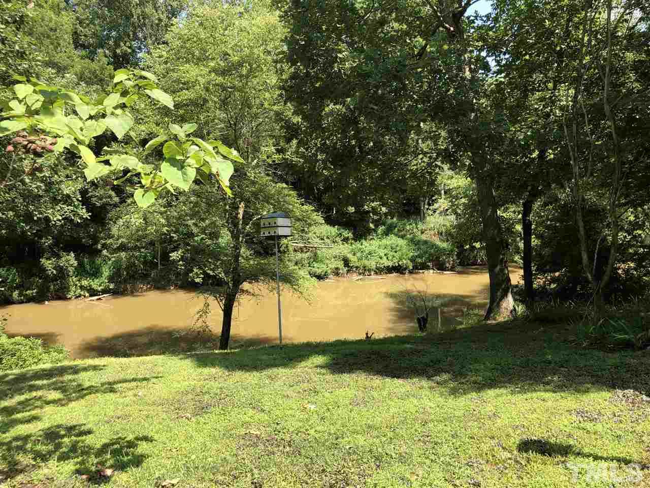 1125 Harris Mill Road Rougemont, NC 27572 - Photo 4 of 4 a view of yard with large trees