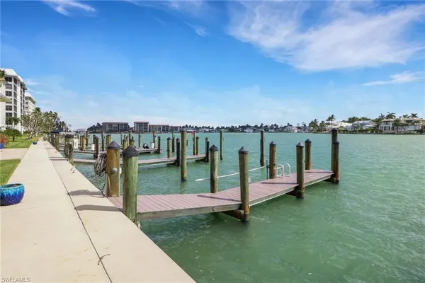 a view of a deck with a big yard