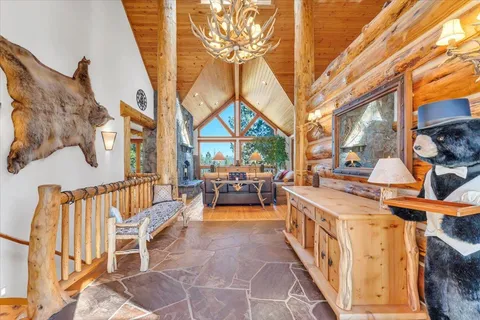 a view of a chairs and tables in the balcony