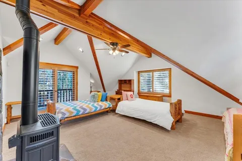 a spacious bathroom with a sink a toilet and shower