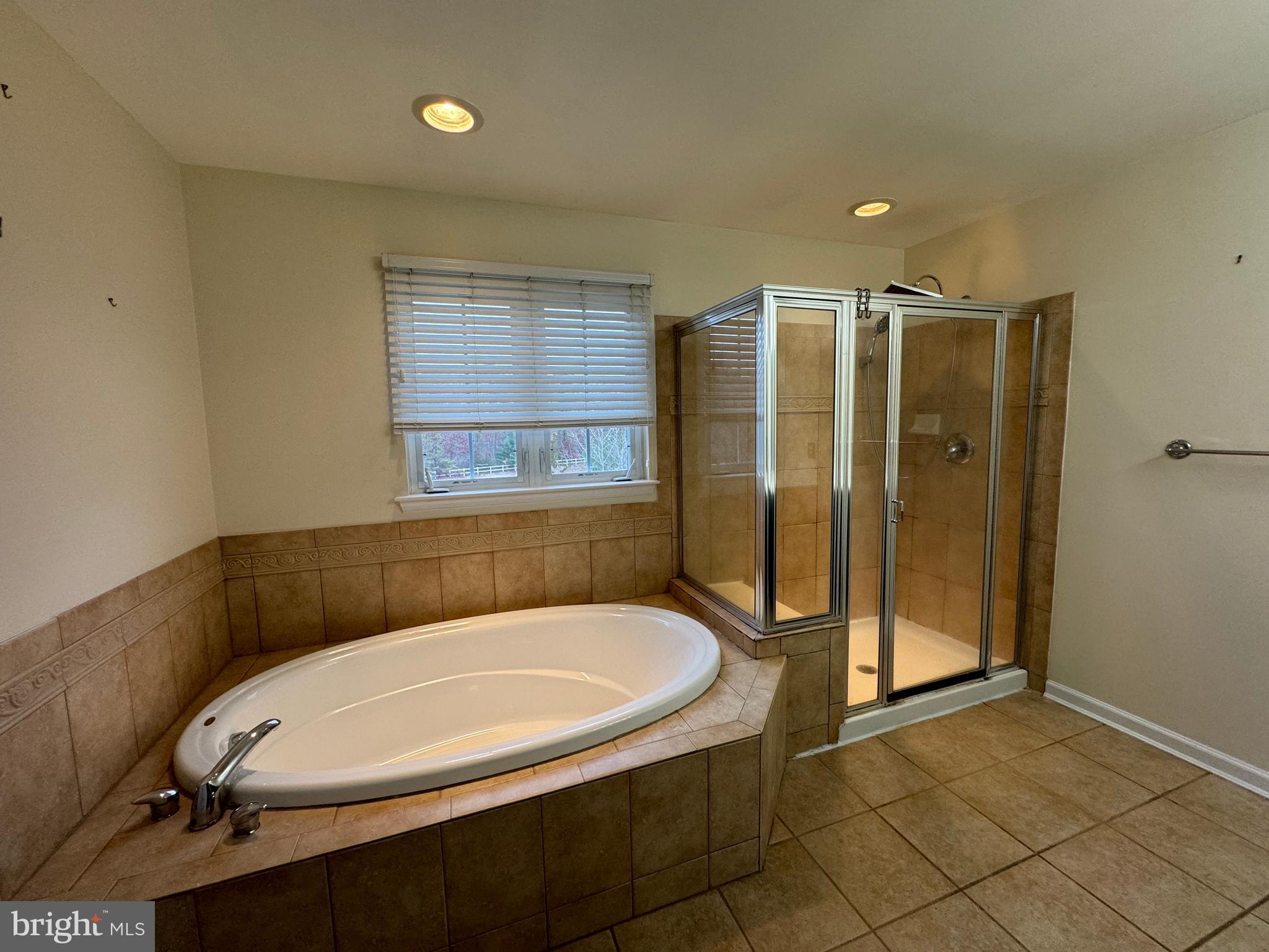 1002 Carlisle Road Egg Harbor Township, NJ 08234 - Photo 12 of 32 a bathroom with a sink and a shower