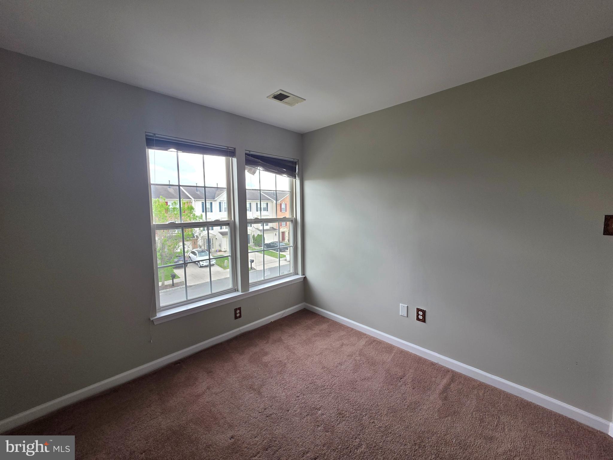 1002 Carlisle Road Egg Harbor Township, NJ 08234 - Photo 21 of 32 an empty room with a window