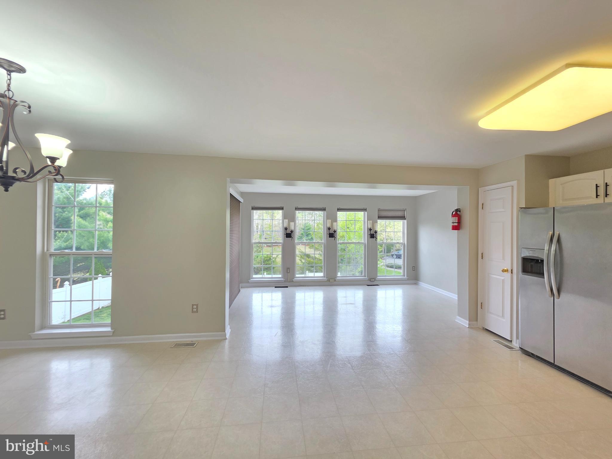 1002 Carlisle Road Egg Harbor Township, NJ 08234 - Photo 4 of 32 a view of an empty room and a window