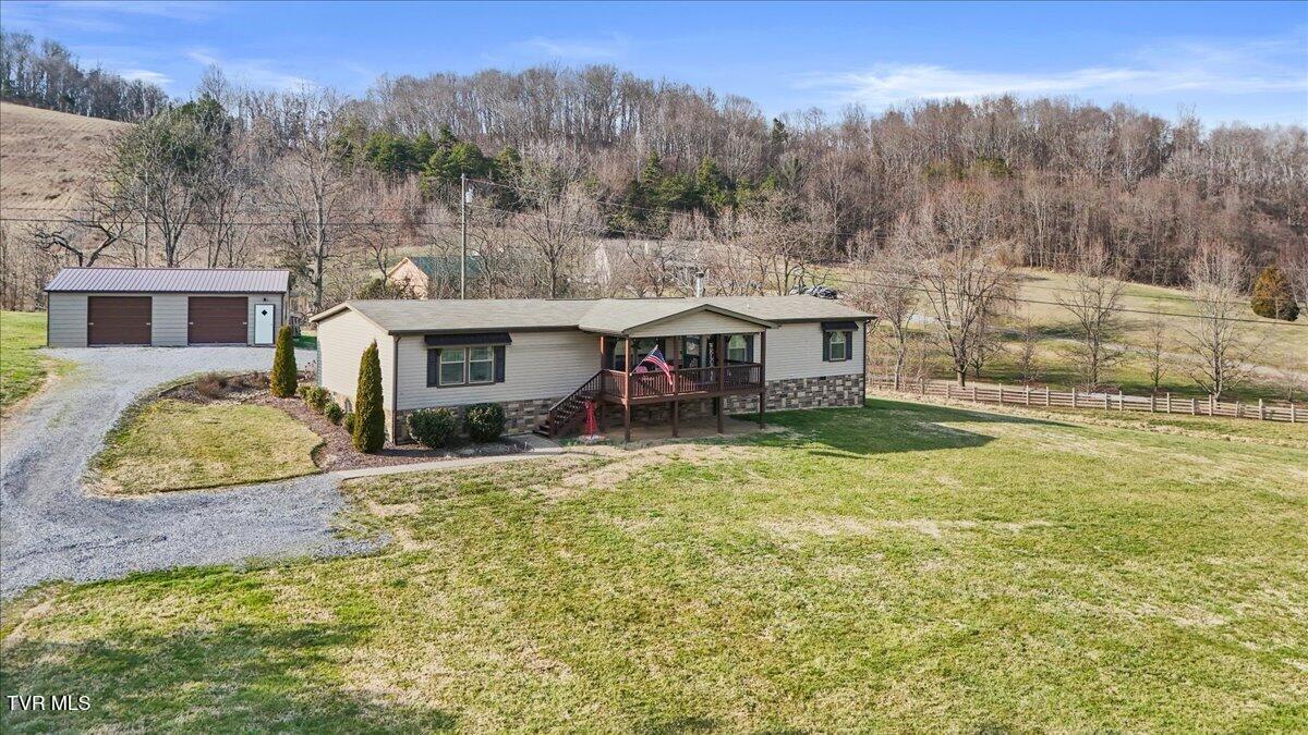 933 Hunting Hill Road Piney Flats, TN 37686 - Photo 1 of 58 01-DJI_20260301155947_0466_D