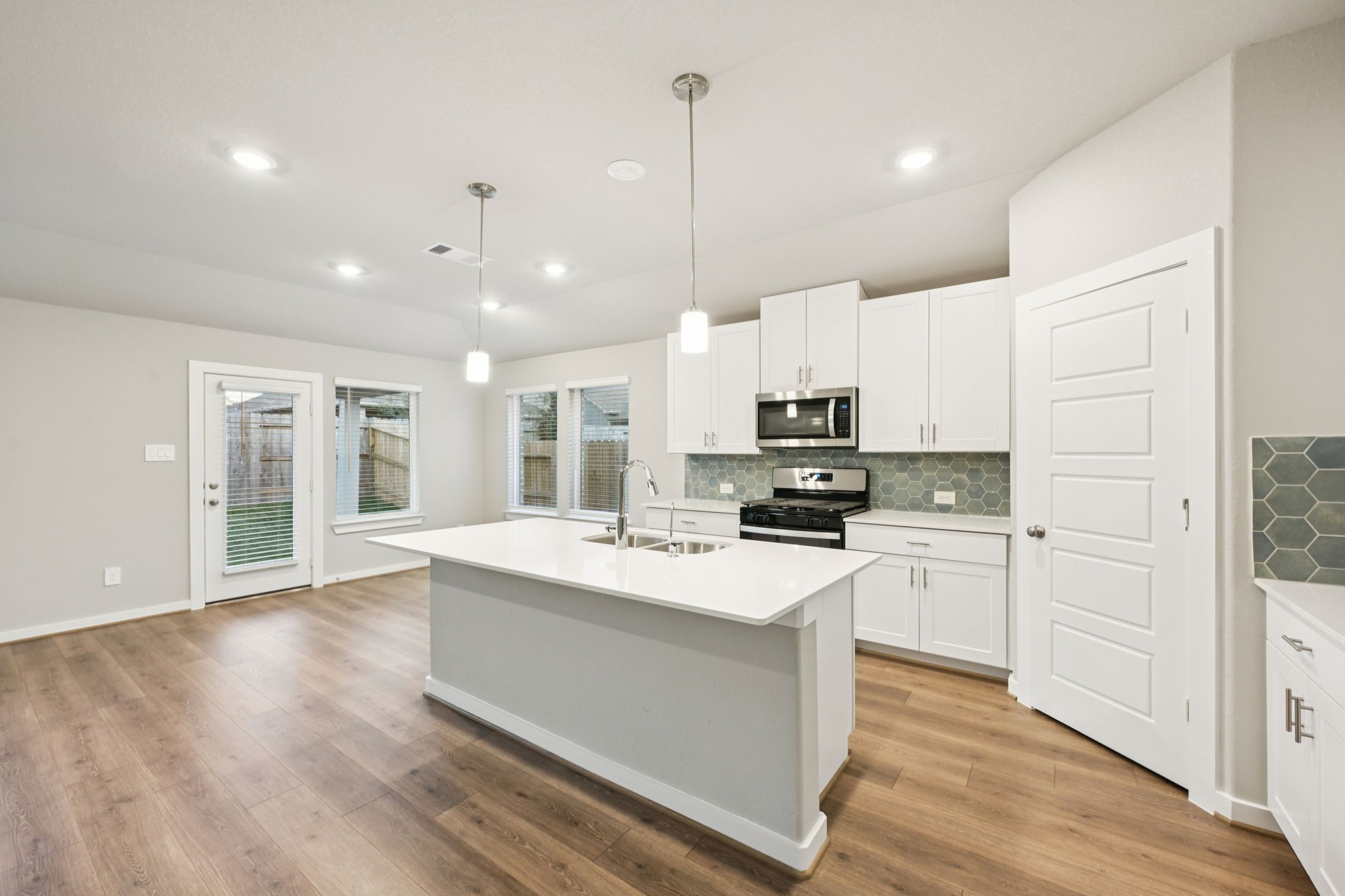 1657 Hopson Ranch Drive Conroe, TX 77301 - Photo 2 of 25 Photo is not of the actual home, but is an inspirational photo of builder’s model home and may depict options, furnishings, and/or decorator features that are not included