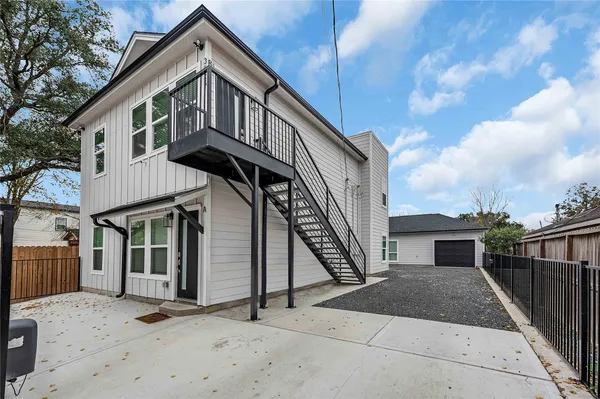 a front view of a house with a balcony