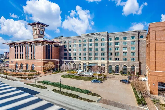 a view of a building with sitting area